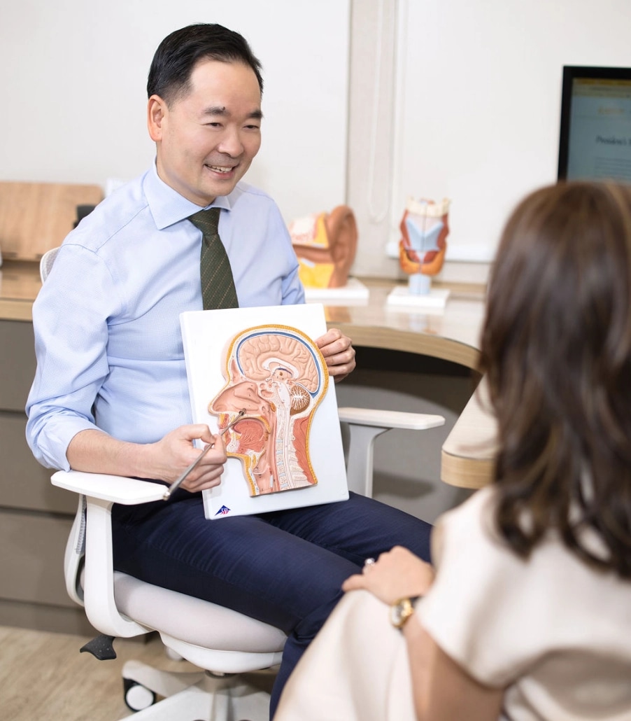 ENT Doctor consulting with patient